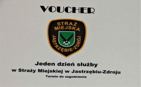 Voucher na "Jeden dzień służby w Straży Miejskiej w Jastrzębiu-Zdroju" z logo formacji i dopiskiem "Termin do uzgodnienia" na białym tle