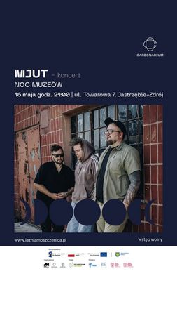 Koncert zespołu MJUT w ramach Nocy Muzeów w Carbonarium (ul. Towarowa 7, Jastrzębie-Zdrój). Wydarzenie odbędzie się 16 maja o godz. 21:00. Na zdjęciu trzej członkowie zespołu na tle ceglanego muru. Wstęp wolny.