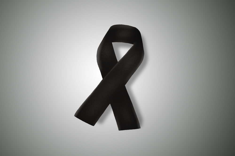 Czarna wstążka na gradientowym tle.