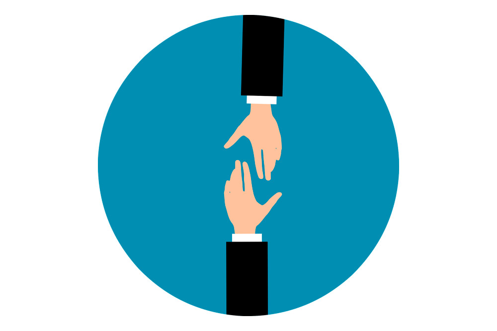 Grafika z dłońmi, jedna wyciągnięta w geście pomocy.