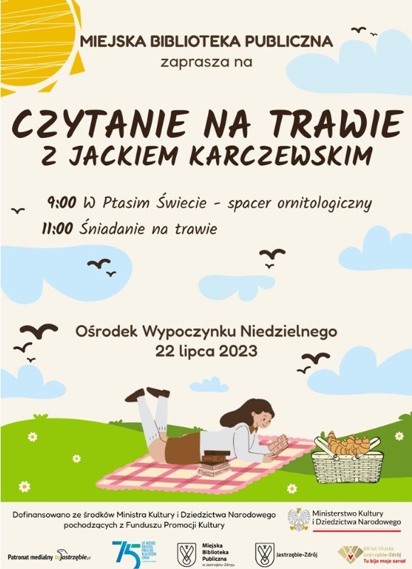 plakat czytanie na trawie 